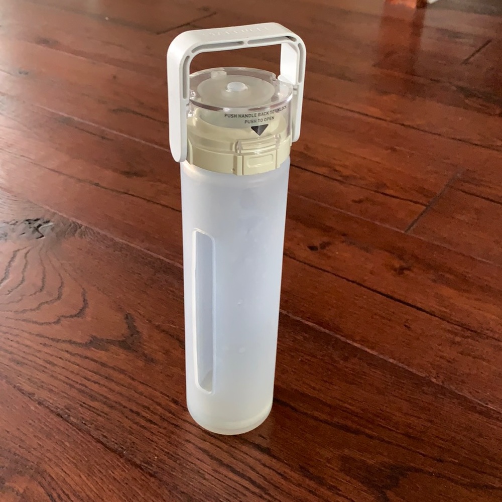 Starbucks glass water bottle with a silicon sleeve